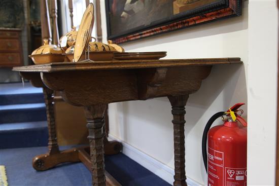 Attributed to A. W. N. Pugin (1812-52). A mid 19th century Reformed Gothic oak writing table, supplied by John Webb and possibly made b